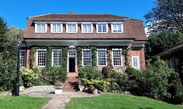 The front exterior of One Oak, a Grade II listed Arts and Crafts house in West Hampstead